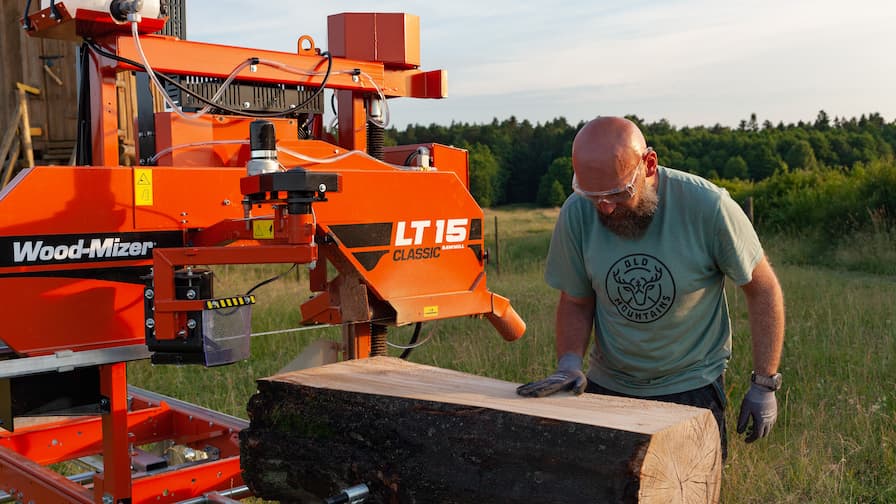 Kamil Broda from OLD Mountains checking the quality after first cut